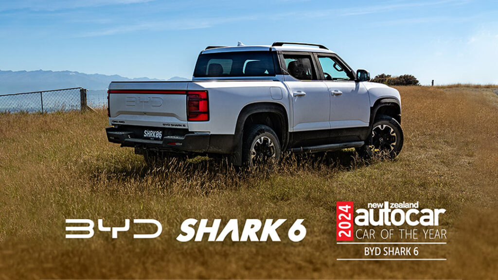 BYD Shark 6 Premium Super Hybrid white parked on farmland