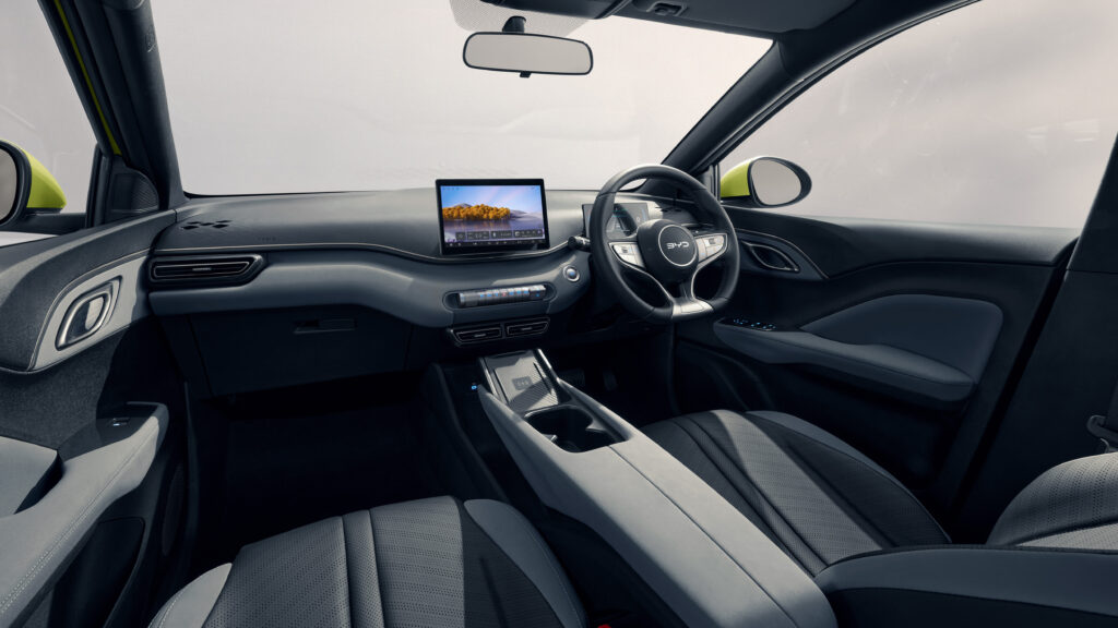 BYD Atto 1 interior dash and steering wheel, passenger POV