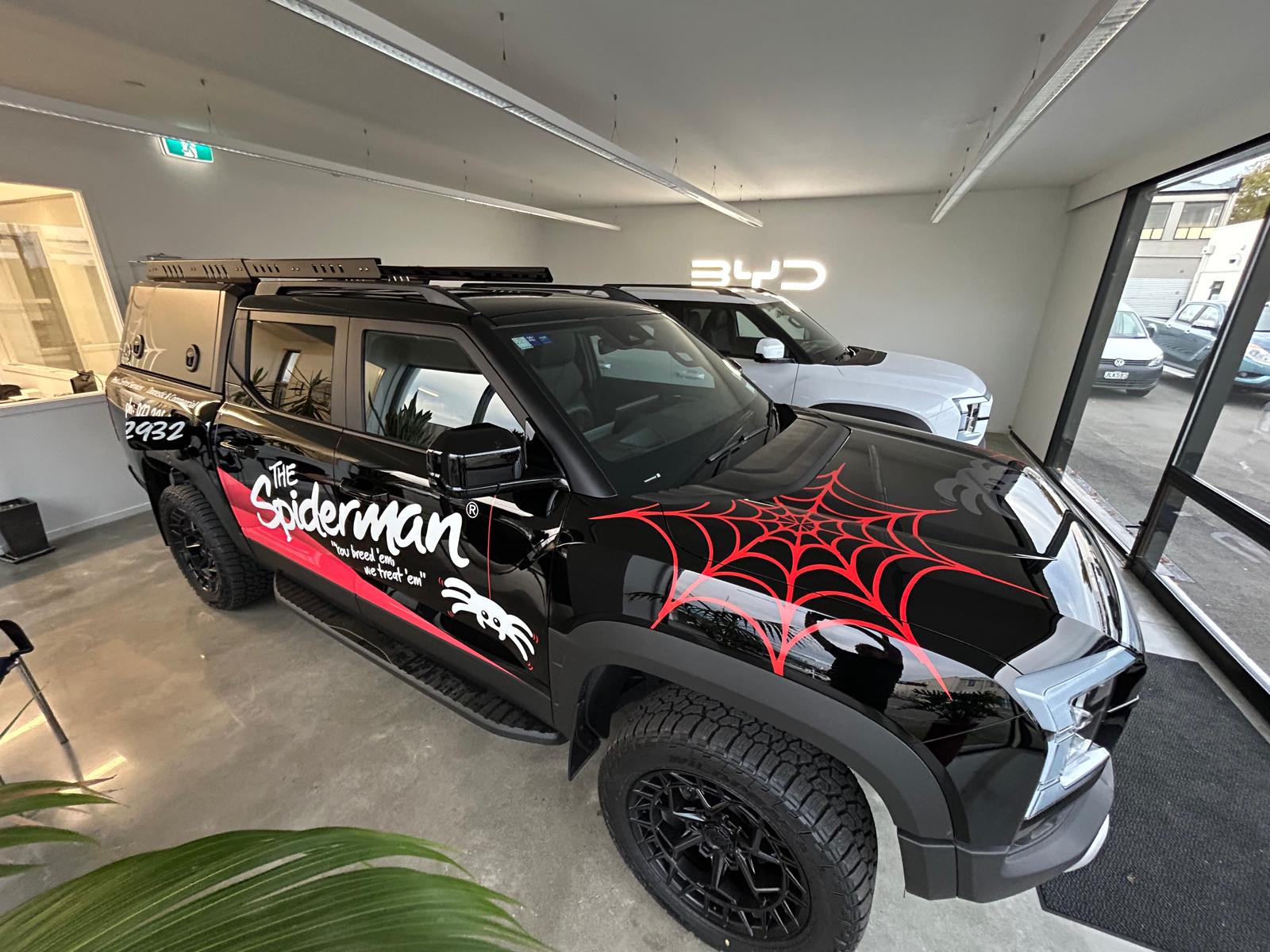 BYD Blenheim showroom with The Spiderman sign-written BYD Shark 6