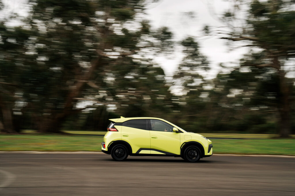 BYD Atto 1 Pine Lime Driving, blurred