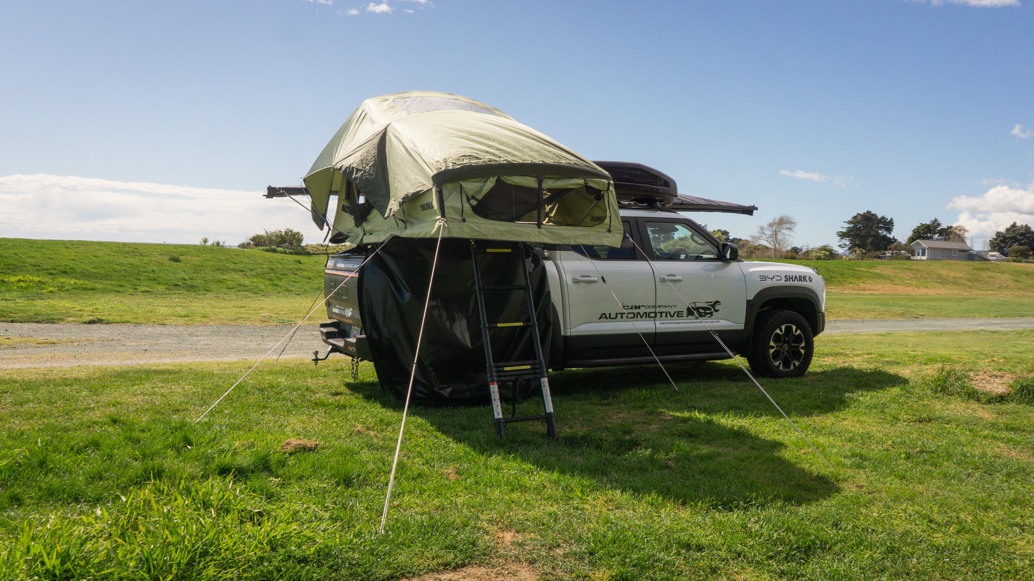 Yakima roof top tent on BYD Shark 6 at golf course Nelson