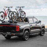 Ute Master Hard Lid on BYD Shark 6 Black with mountain Bikes secured by Yakima Bike Rack