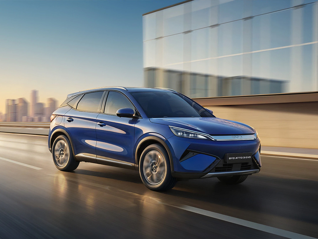 BYD Atto 3 Evo Athene Blue driving on city street