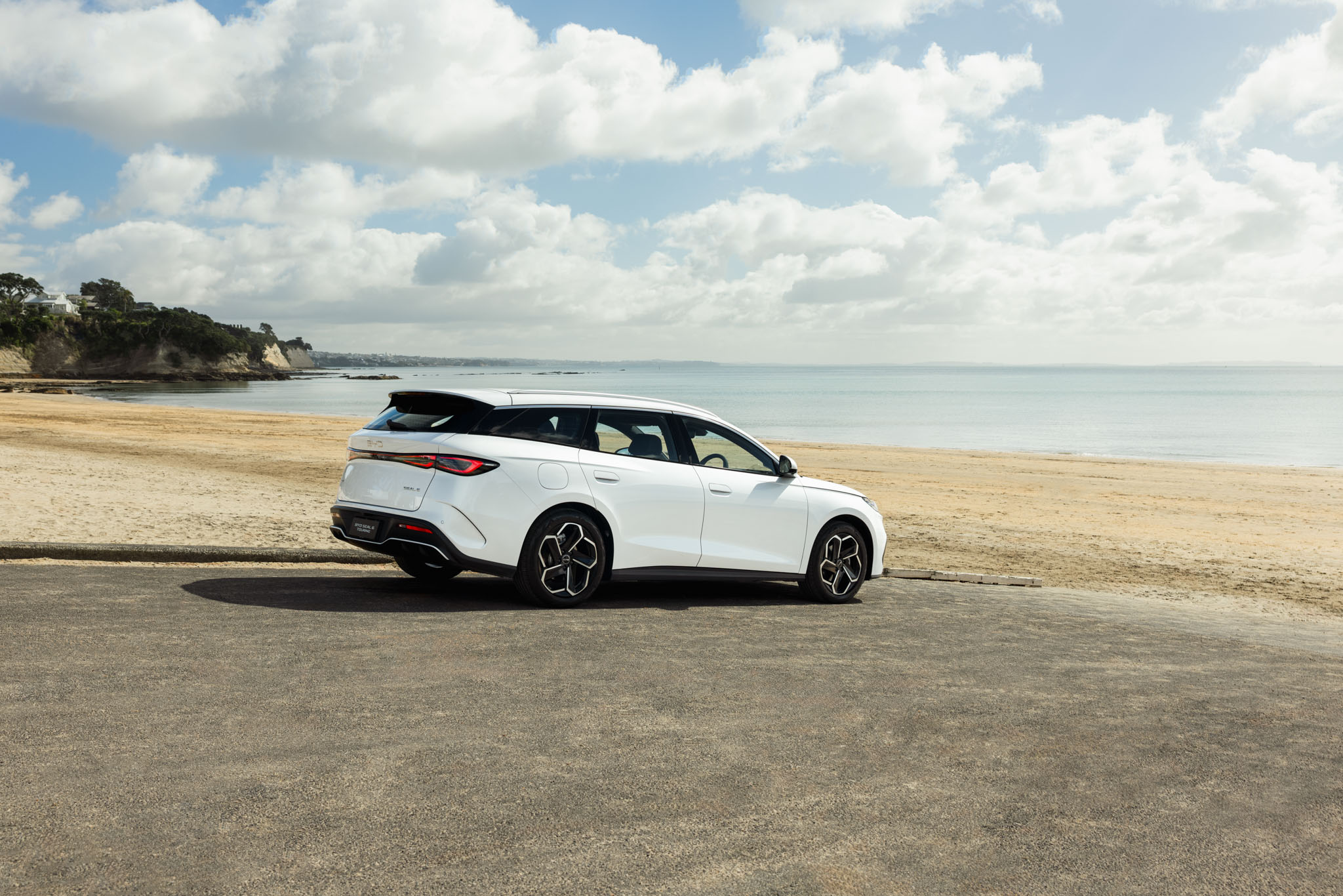 BYD Seal 6 Touring parked on boat ramp at beach